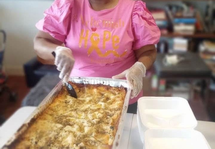 Nehemiah Hope Foundation volunteers preparing meals for Nemours Children Hospital patients